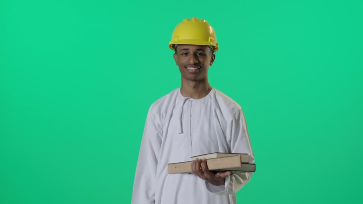 Arab Engineer in Thobe Giving Thumbs Down Green Screen