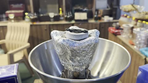 Agarwood Burning on Charcoal in Metal Incense Burner