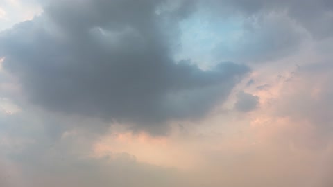 Storm Clouds Moving Across Sunset Sky Timelapse