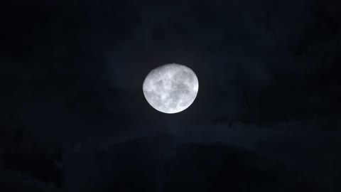 Full Moon in Night Sky with Clouds Footage