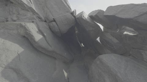 A rocky passage between granite mountain rocks in Saudi Arabia.