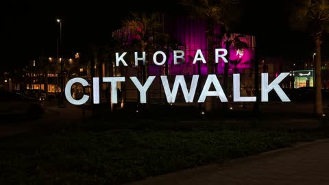 The illuminated City Walk sign in the city of Khobar, Saudi Arabia.