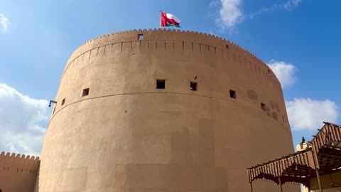 Nizwa Fort Oman Tower and Flag Static Shot