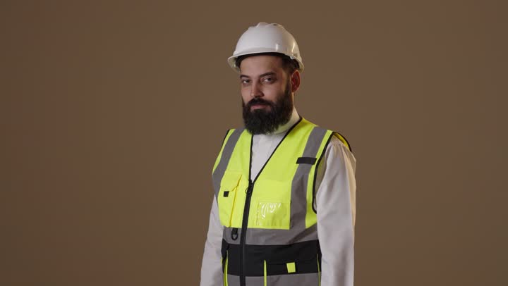 Saudi Engineer Wearing Safety Vest and Hard Hat