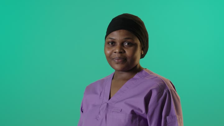African Nurse Purple Scrubs Green Screen Studio
