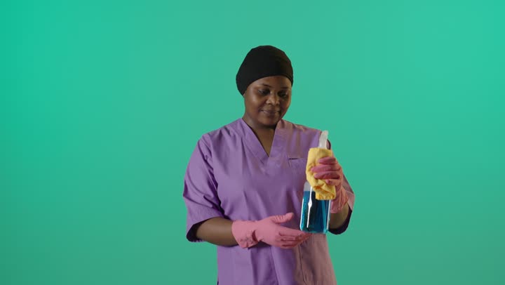 African Female Cleaner Green Screen Thumbs Up Gesture
