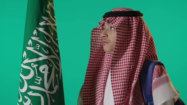 Saudi Student with National Flag on Green Screen