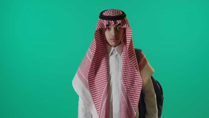 Saudi Man in Traditional Dress Making Stop Gesture Green Screen