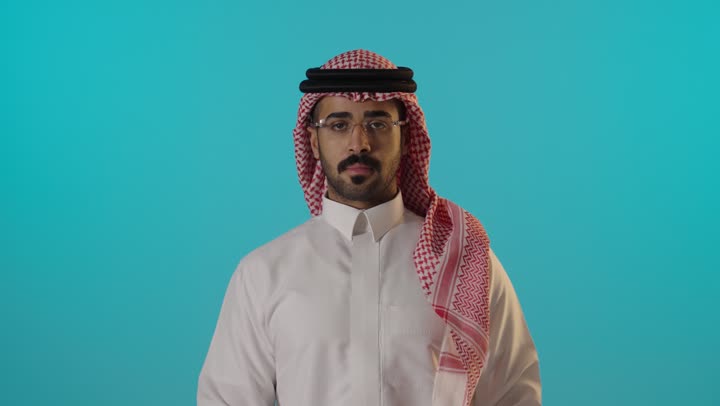 Saudi Man Holding Fresh Salad Against Blue Background