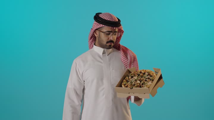 Saudi Man Giving Thumbs Down Holding Pizza Box