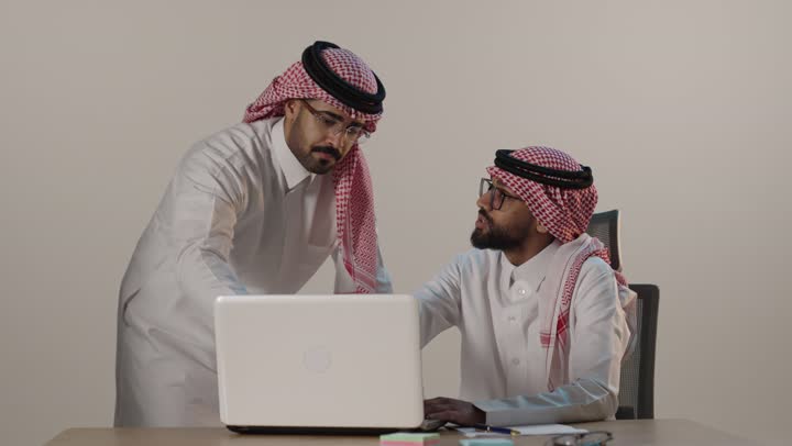Saudi Businessmen Office Laptop Collaboration Video
