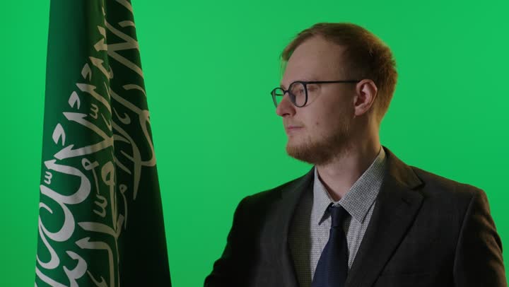 Businessman with Saudi Flag on Green Screen