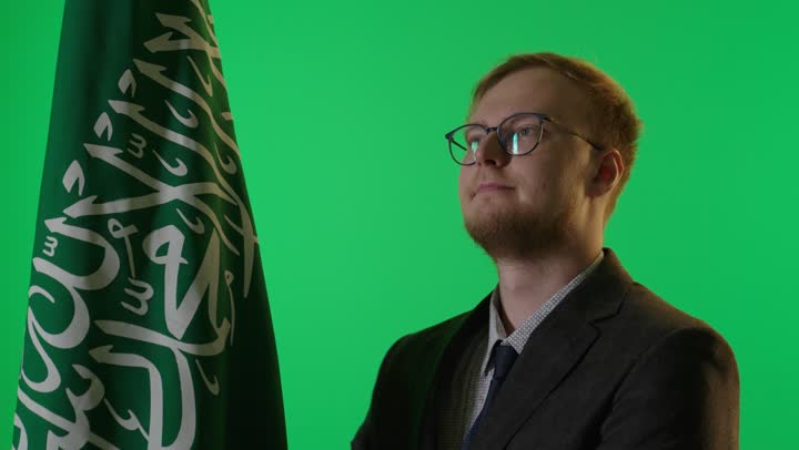 Businessman with Saudi Flag Green Screen Portrait