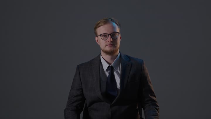 Businessman Giving Thumbs Up Gesture Studio Portrait