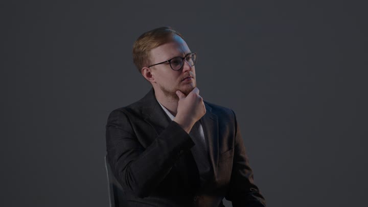 Thinking Businessman in Suit Studio Portrait Footage