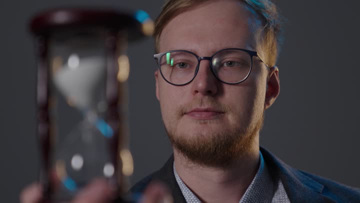 Businessman Watching Hourglass Time Management Footage
