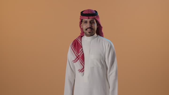 Saudi Man in Traditional Thobe Studio Portrait Clip