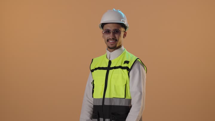 Middle Eastern Engineer in Safety Vest and Hard Hat