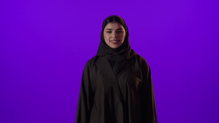 Saudi Woman in Abaya Giving Thumbs Up Studio Footage