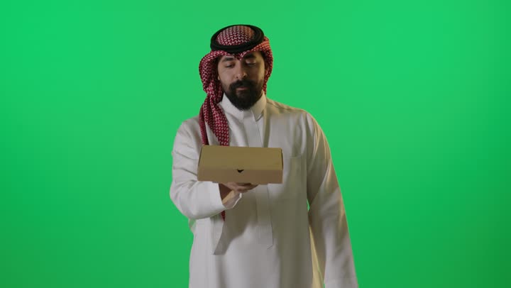 Saudi Man Opening Pizza Box Green Screen Studio Footage