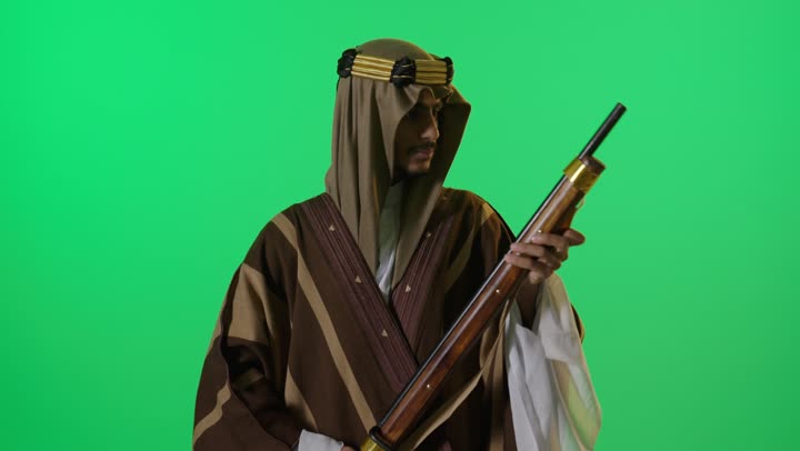 Saudi Man in Founding Day Attire with Rifle Green Screen