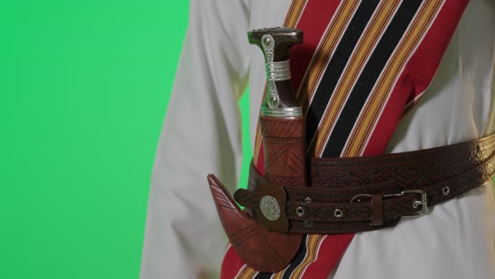 Saudi Man Traditional Dagger Drawing Green Screen
