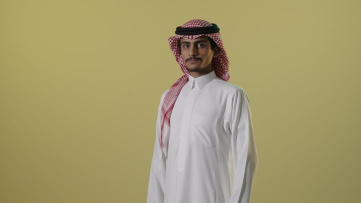 Saudi Man in Traditional Dress Crossing Arms Founding Day