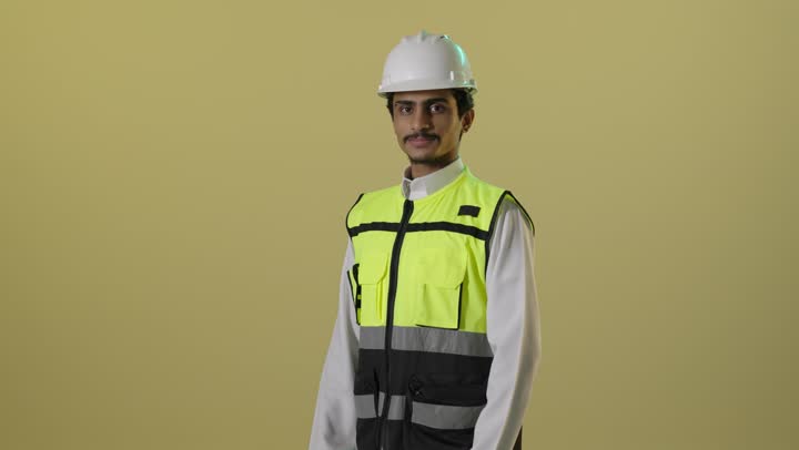 Saudi Male Engineer in Safety Vest and Hard Hat