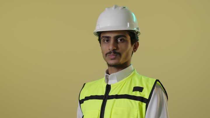 Saudi Engineer Wearing Safety Vest and Hard Hat Studio