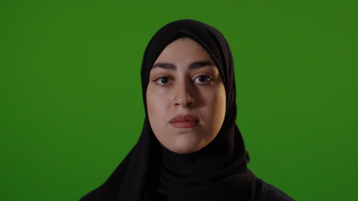 Saudi Woman in Hijab Stop Gesture Green Screen