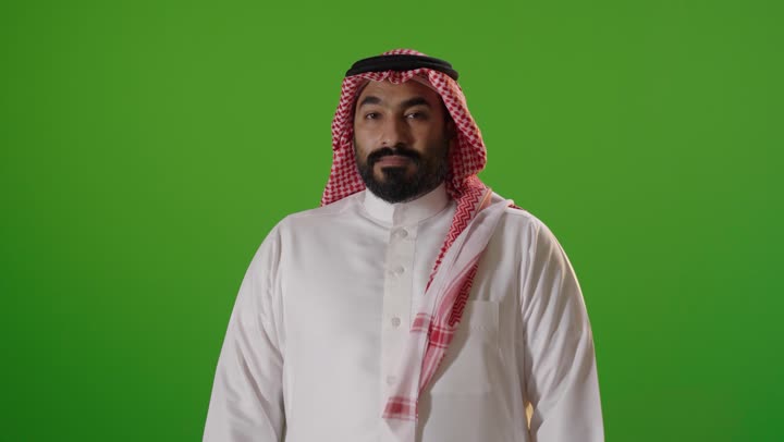 Saudi Man Smiling on Green Screen Studio Portrait