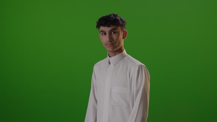 Young Arab Man in Thobe on Green Screen Studio