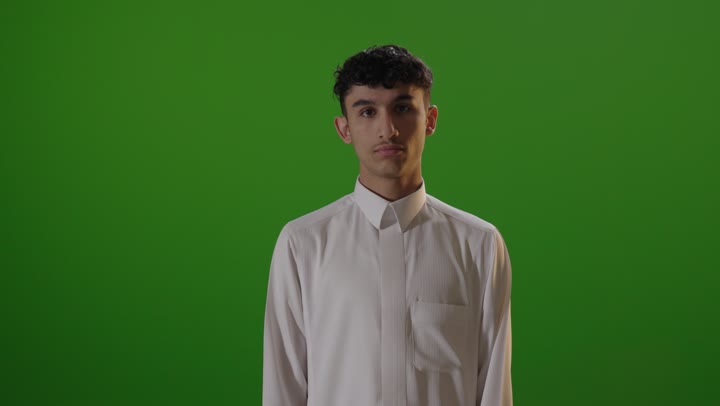 Arab Man in Thobe Thumbs Down Green Screen