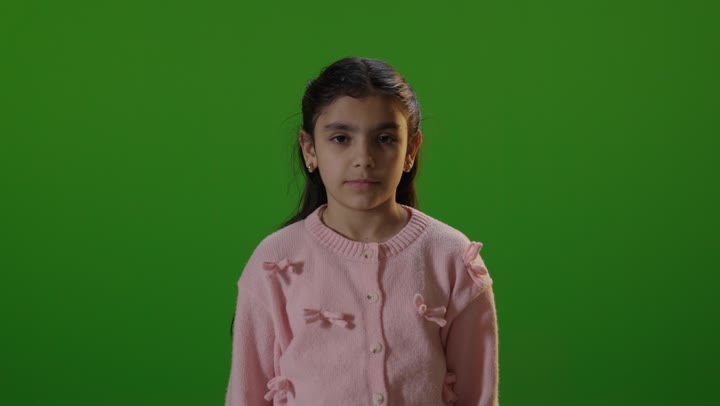 Young Arab Girl Smiling on Green Screen Studio Footage