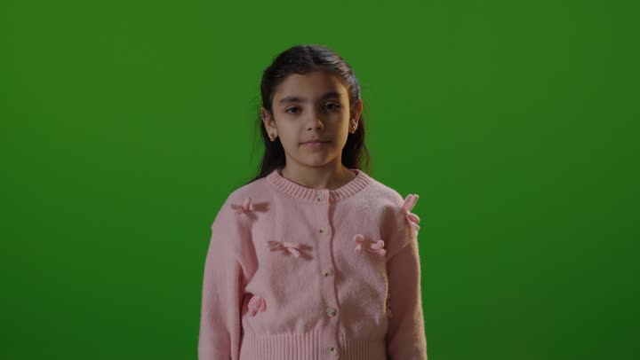 Girl Giving Thumbs Up on Green Screen Background