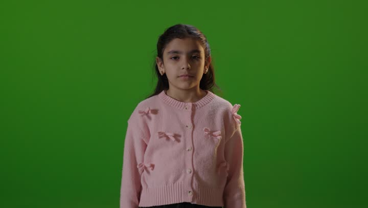Young Girl Raising Hand Stop Gesture Green Screen