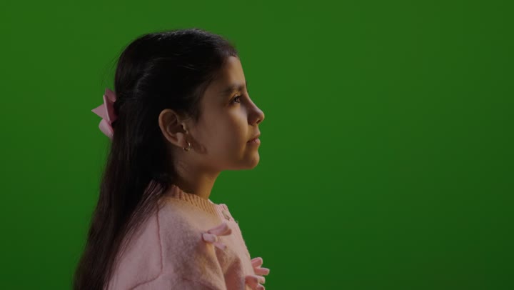Middle Eastern Girl Smiling on Green Screen Studio Portrait
