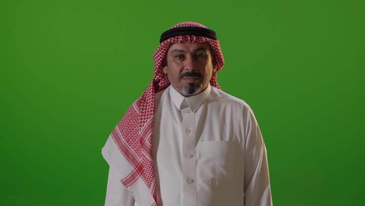 Saudi Man Making Stop Gesture on Green Screen