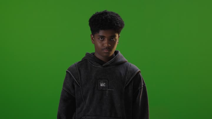 Young Saudi Man Giving Thumbs Up Gesture on Green Screen