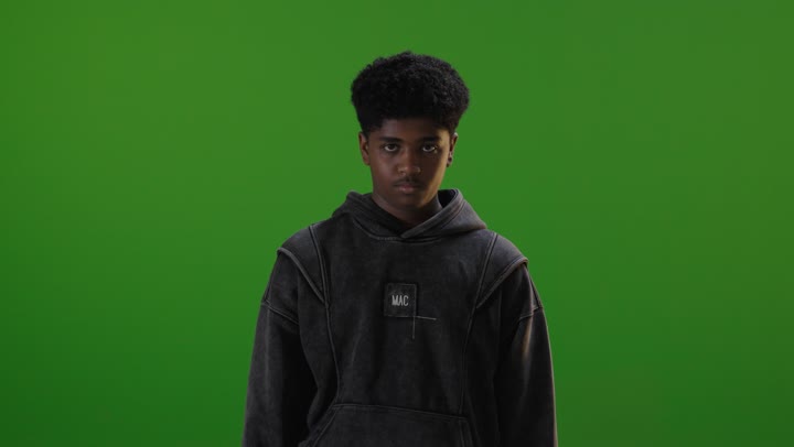 Young Saudi Man Raising Hand Stop Gesture Green Screen