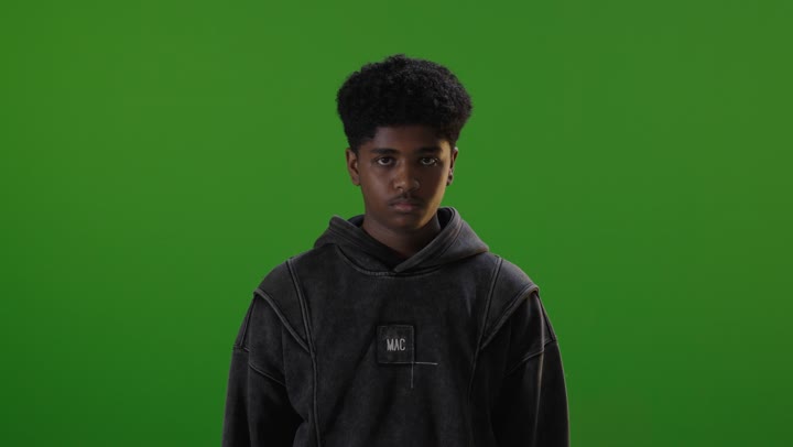 Saudi Young Male Smiling on Green Screen Background