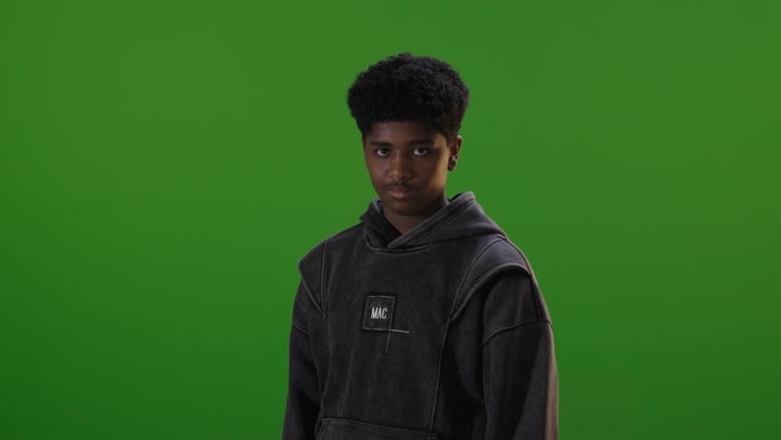Saudi Boy Wearing Black Hoodie on Green Screen
