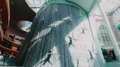 The Dubai Mall Waterfall Human Divers Sculpture