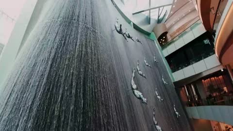 Dubai Mall Indoor Waterfall with Silver Divers Sculptures