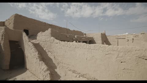 Traditional Mud Brick Village Ruins Desert Tracking Shot