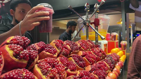 Fresh Pomegranate Juice Vendor Street Market Footage