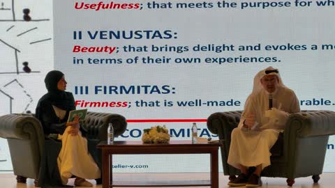 Saudi Man Speaking at Architecture Panel Discussion