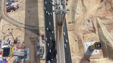 The suspended bridge in Wadi Laban in the city of Riyadh, the roads and streets with traffic in the Kingdom of Saudi Arabia.