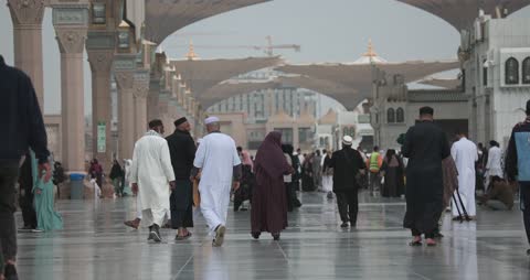 Pilgrims Walking in Al-Masjid an-Nabawi Madinah Courtyard