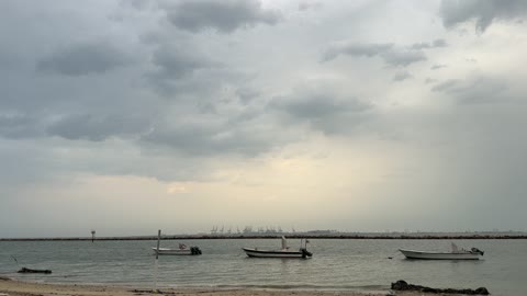 Fishing Boats Anchored Near Industrial Port Footage